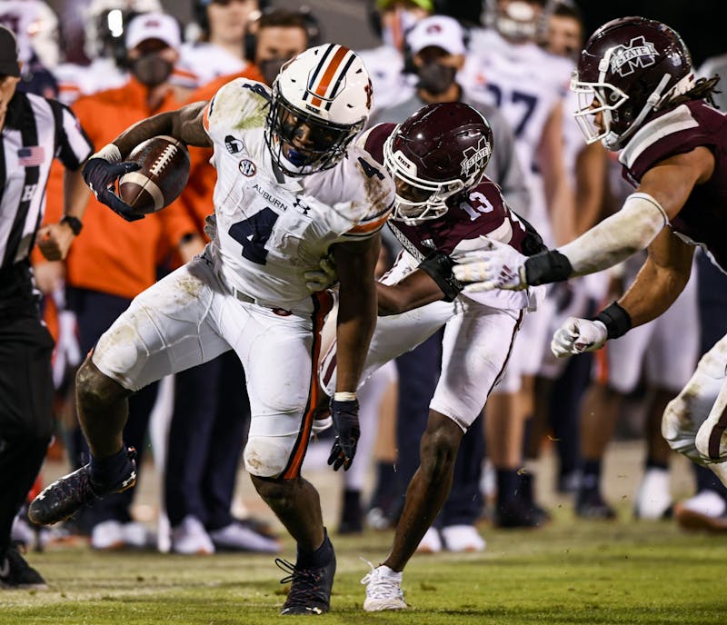 Oct 3, 2020; Starkville, Mississippi, USA; Tank Bigsby (4) running the ball during the game between Auburn and Mississippi State at Davis Wade Stadium. Mandatory Credit: Todd Van Emst/AU Athletics