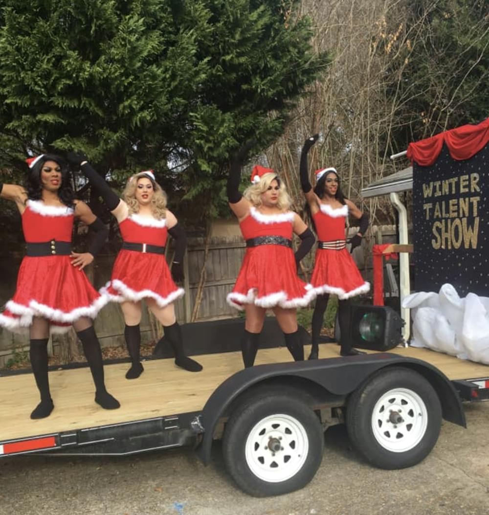<p>Drag Queens perform on the Pride on The Plains float at the Opelika Christmas Parade on Saturday, Dec. 7, 2019 in Opelika, Ala.</p>