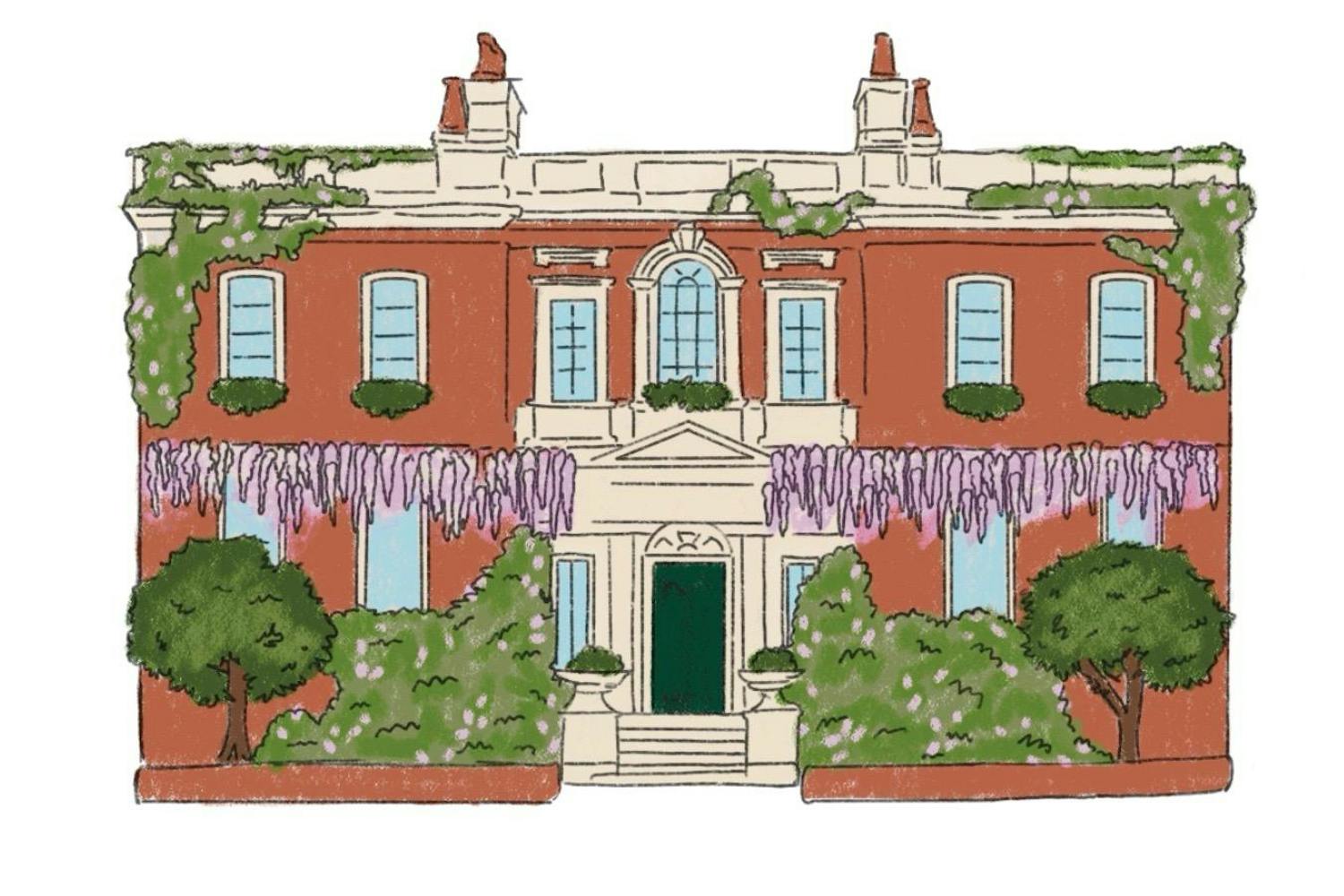 A two-story red brick house is surrounded by lush green plants and wisteria flowers, featuring decorative windows and a central doorway.