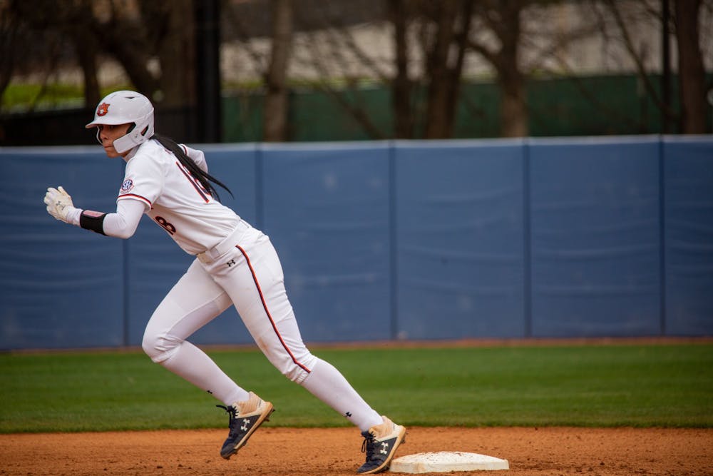 <p>Justus Perry (18) running during the game between Auburn and Southeast Missouri State at Jane B Moore Field on Feb 14, 2021; Auburn, AL, USA. Photo via: Matthew Shannon/AU Athletics</p>