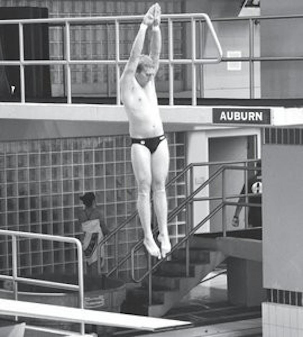 Sophomore Michael Beran placed second in 3-meter diving Oct. 12. (Danielle Lowe / ASSISTANT PHOTO EDITOR)