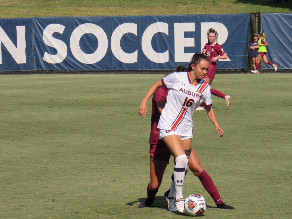 <p>Rocio Sanders (16) dribbles the ball in a match against Florida State on Sept. 12, 2021, at the Auburn Soccer Complex in Auburn, Alabama.</p>