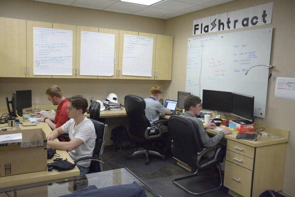 <p>FlashTract team members work in their office at the Auburn Research Park on April 8, 2019.</p>