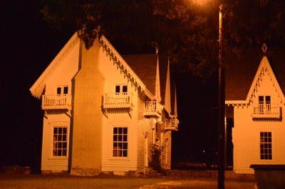 Jeff Pokorney unlocks the door to Spring Villa Mansion, site of a local legend involving the haunting of multiple ghosts.