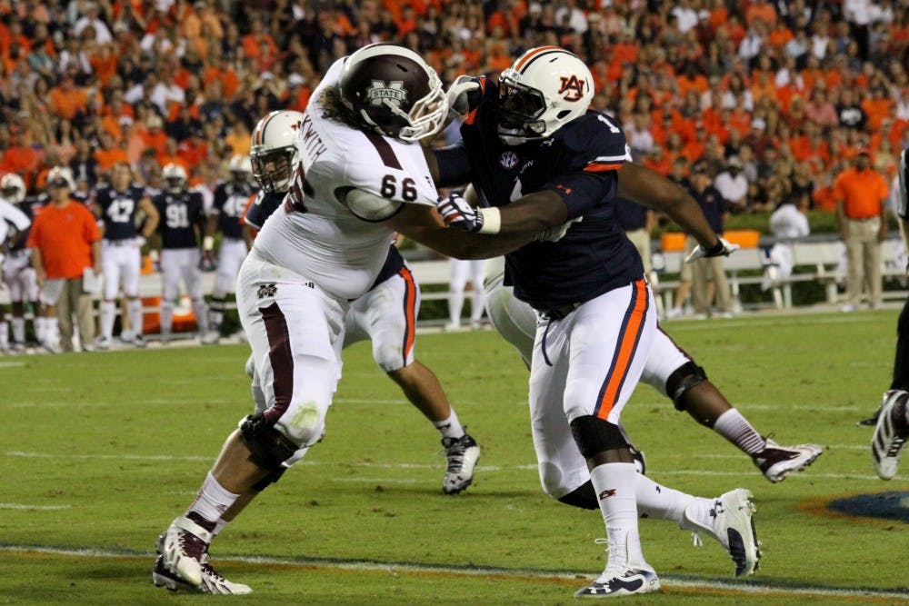 Trovon Reed is defended by a Mississippi State player on Saturday, September 14. (Katherine McCahey / SPORTS PHOTOGRAPHER)