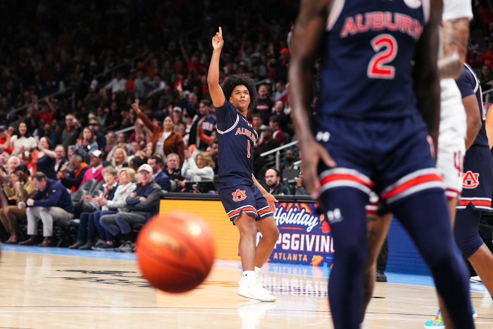 ATLANTA, GA - DECEMBER 09 - Auburn's Aden Holloway (1) during the game between the Auburn Tigers and the Indiana Hoosiers at State Farm Arena in Atlanta, GA on Saturday, Dec. 9, 2023.

Photo by Zach Bland/Auburn Tigers
