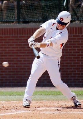 Freshman Bobby Andrews swings against Vanderbilt Sunday. The Tigers lost 6-2. (Emily Adams / Photo Editor)