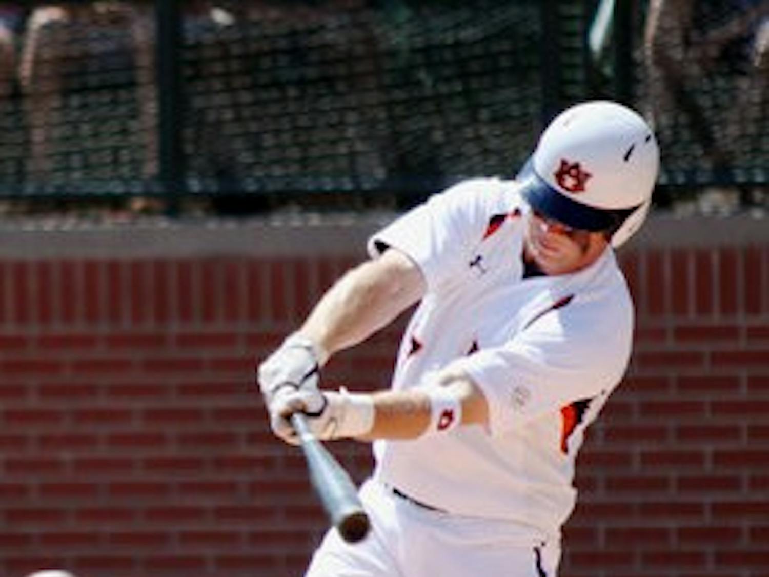 Freshman Bobby Andrews swings against Vanderbilt Sunday. The Tigers lost 6-2. (Emily Adams / Photo Editor)