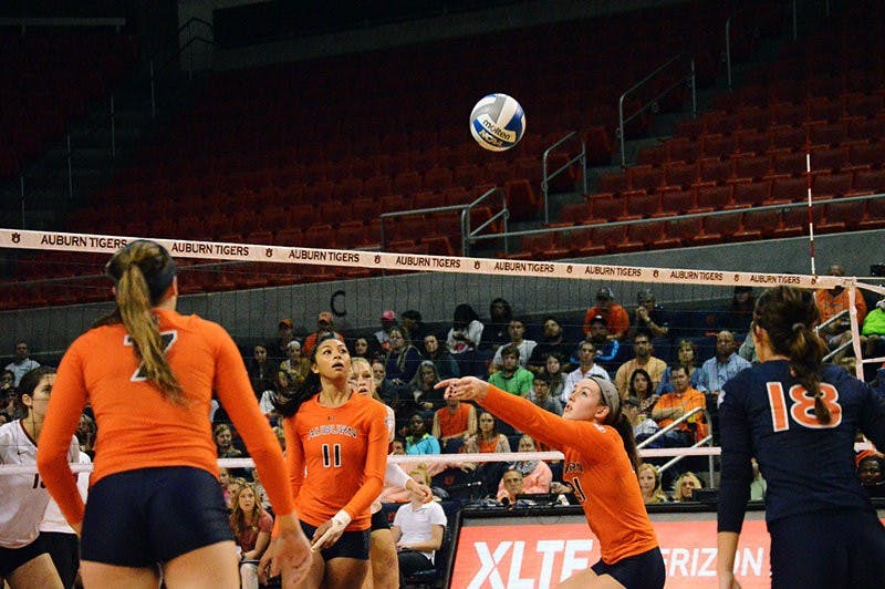 Alexa Filley #21 hits ball during Auburn vs Alabama volleyball game on Oct 22, 2014. (Emily Enfinger | Assistant Photo Editor)