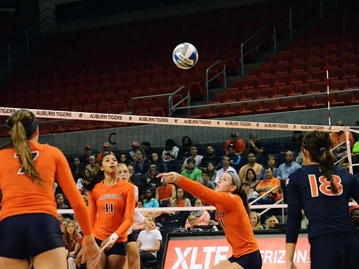 Alexa Filley #21 hits ball during Auburn vs Alabama volleyball game on Oct 22, 2014. (Emily Enfinger | Assistant Photo Editor)