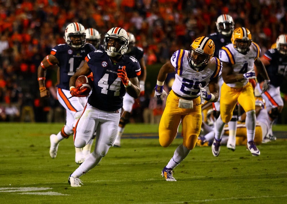 Cameron Artis-Payne ,#44 , runs with ball. Auburn vs LSU, Oct 4, 2014. (Kenny Moss | Photographer)