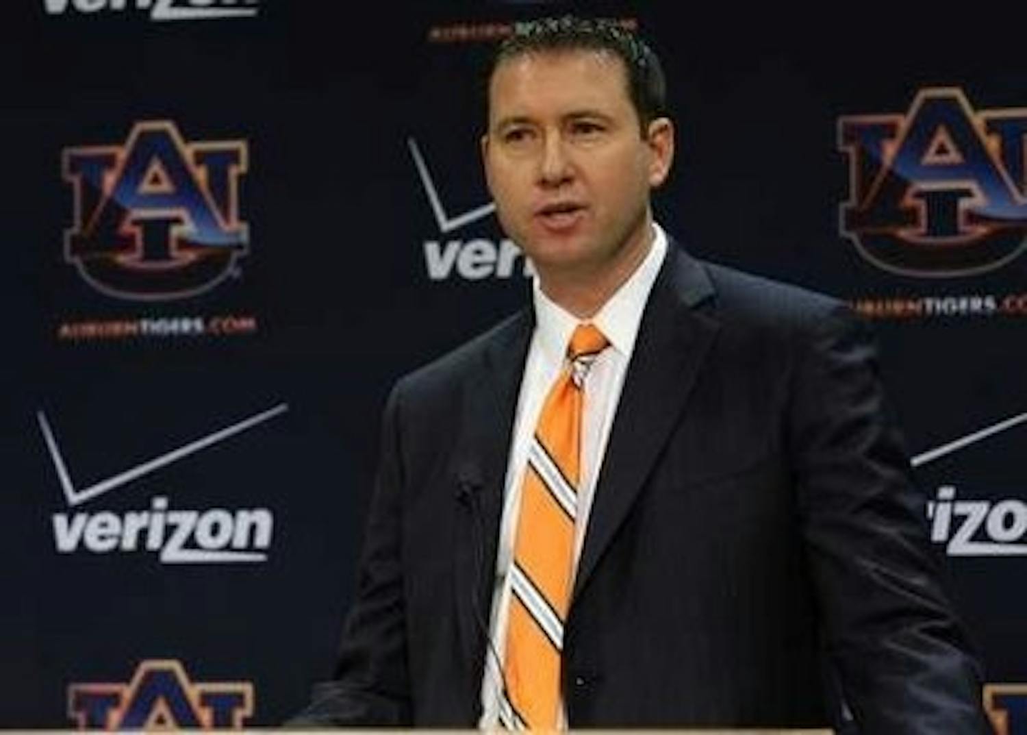 New offensive coordinator Scot Loeffler answers questions during his introductory press conference. (TODD VAN EMST)