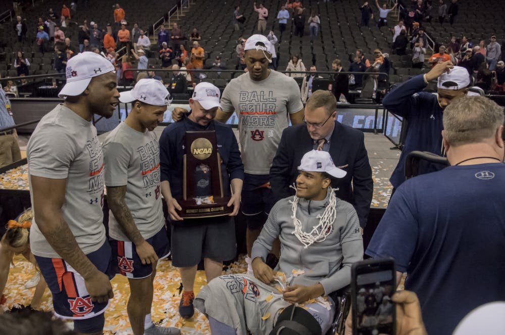 Chuma Okeke celebrates with teammates. Auburn basketball vs. Kentucky in the Midwest Regional Final of the 2019 NCAA Tournament on March 31, 2019, in Kansas City, Mo. Photo courtesy Lauren Talkington / The Glomerata.