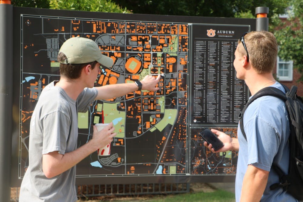 <p>Auburn University students use campus maps during the first week of school in Auburn, Ala.</p>