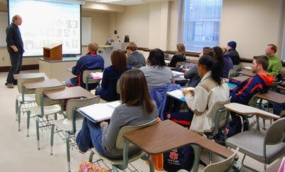 Students in "Fame, Celebrity and Media Culture" listen to George Plasketes' discussion of Andy Warhol. The class is offered to radio, TV and film majors. (Rebekah Weaver / ASSISTANT PHOTO EDITOR)