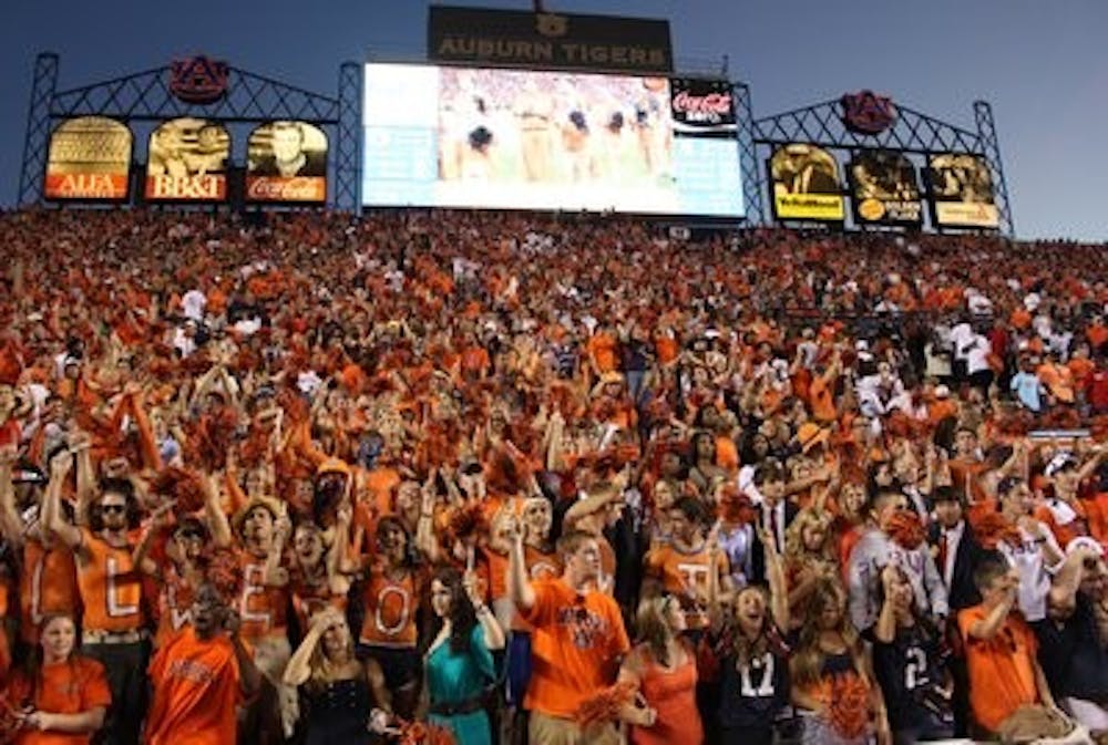 The student section celebrates an Auburn victory. (Emily Adams/PHOTO EDITOR)