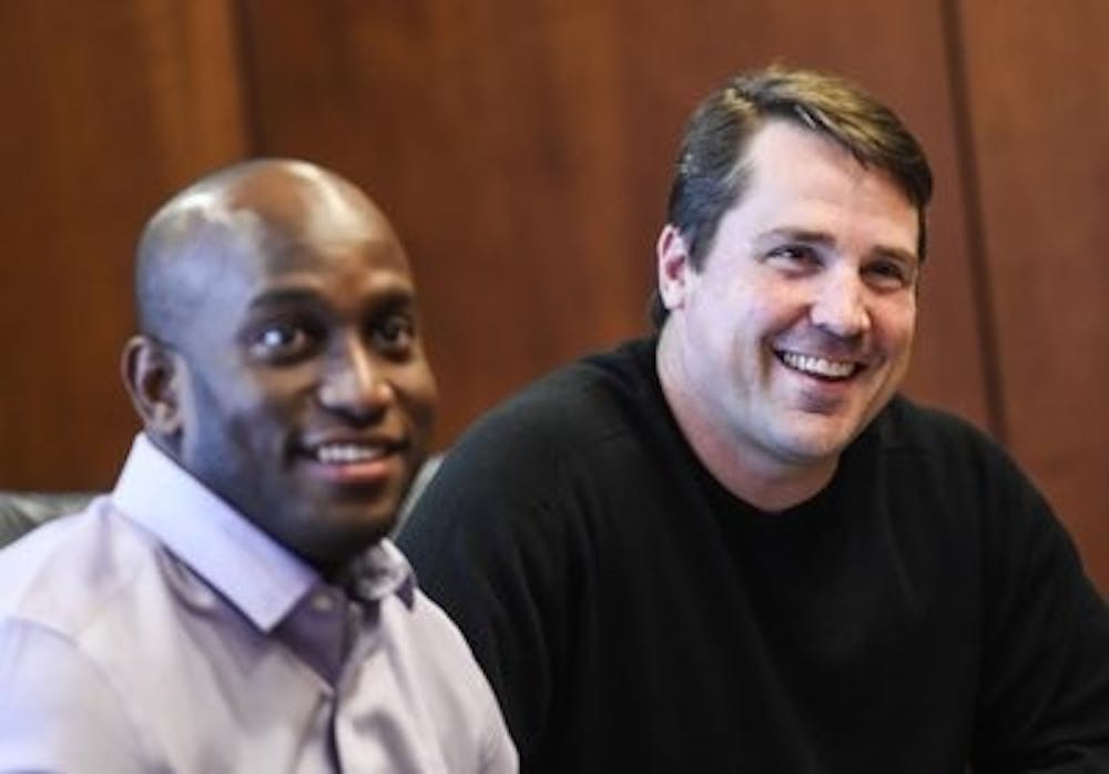 <p>Travaris Robinson and Will Muschamp during National Signing Day on Wednesday, February 4, 2015 in Auburn, Ala. (Contributed by Wade Rackley | Auburn Athletics)</p>