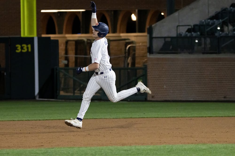 <p>Ike Irish (#18) shows the outfield student section some love as he rounds the bases following his home run versus UAB in Plainsman Park on February 20th, 2024.</p>