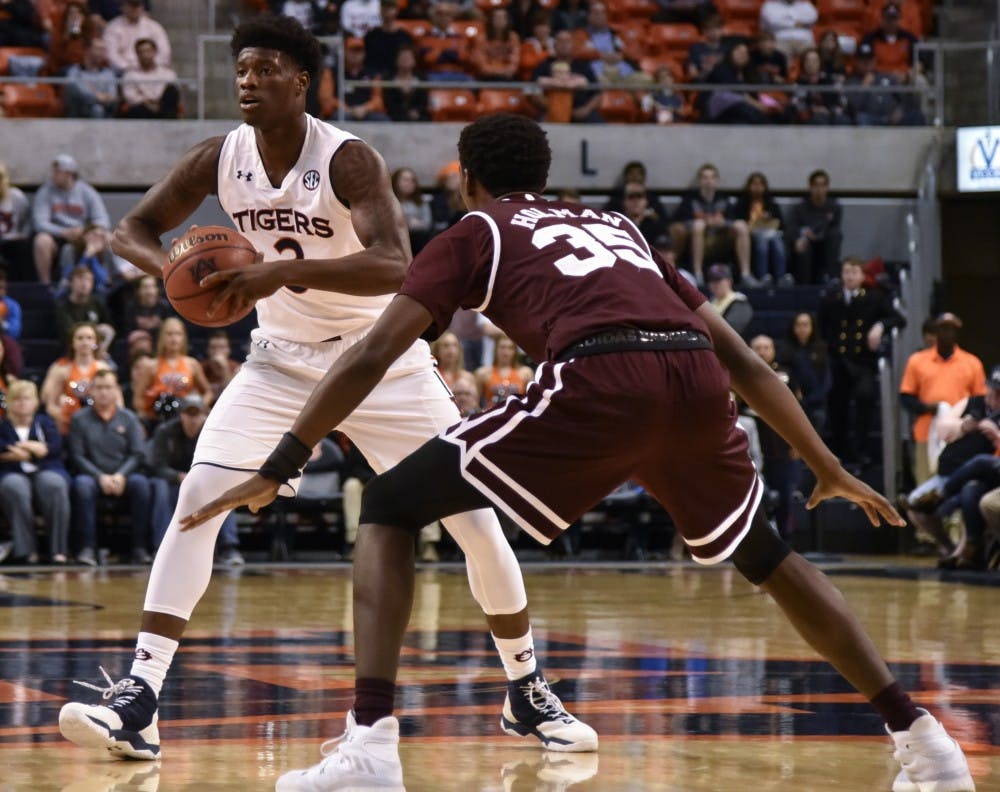 Auburn Tigers forward Danjel Purifoy (3) squares off against Mississippi State Bulldogs forward Aric Holman (35) during the first half of the Auburn vs Mississippi State basketball on Tuesday, Feb. 7, 2017, in Auburn, Ala.