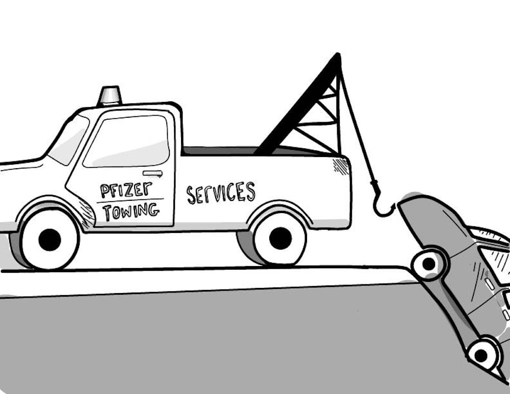 <p>A tow truck reading 'Pfizer Towing Services' pulls a car from a ditch.&nbsp;</p>