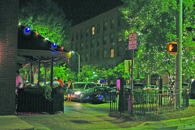 Locals enjoy Auburn's nightlife outside Hamilton's restaurant on Magnolia Avenue. (Rebecca Croomes / ASSISTANT PHOTO EDITOR)