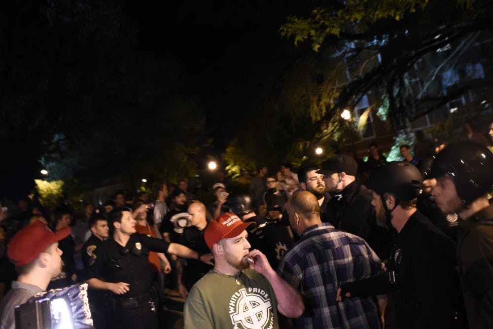 Protesters fill Thach Avenue near South College Street after alt-right leader Richard Spencer's talk on Tuesday, April 18, 2017 in Auburn, Ala. 