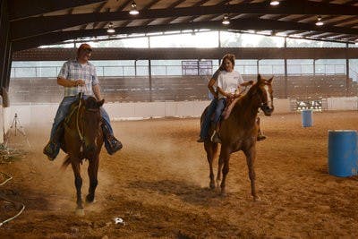 Cowboy Church members attend a barrel racing event held by the church Thursday afternoon.  (Raye May / ASSOCIATE INTRIGUE EDITOR)