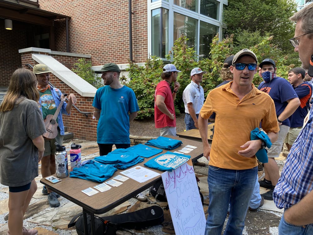 <p>The officers at the SNR table encourage involvement for new and returning students during Welcome Week hosted by the College of Forestry and Wildlife Sciences.</p>