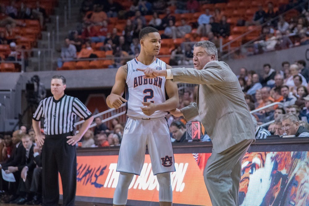 Auburn Tigers Head Coach Bruce Pearl gives Auburn Tigers guard Bryce Brown (2) some instruction during the Georgia Vs. Auburn basketball game at Auburn Arena, Wednesday, Feb, 24, 2016.