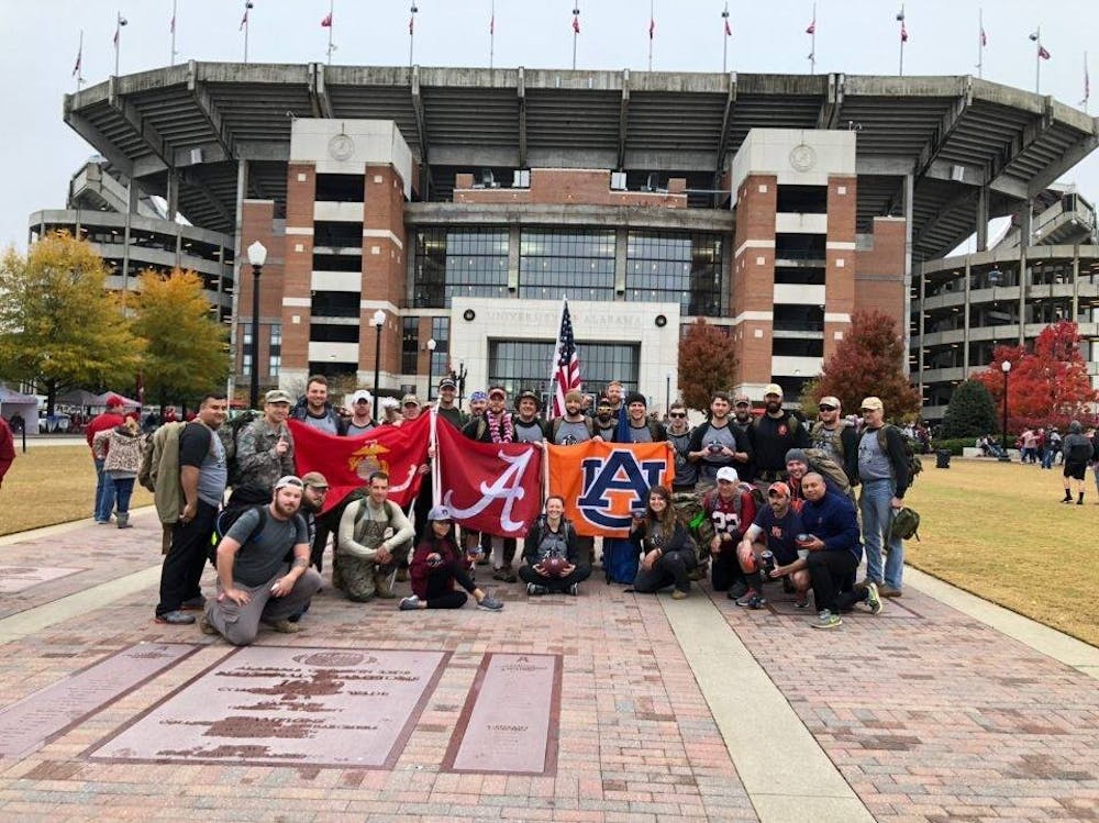 <p>Auburn and Alabama student veterans on the University of Alabama campus after the 2018 Operation Iron Ruck march.</p>