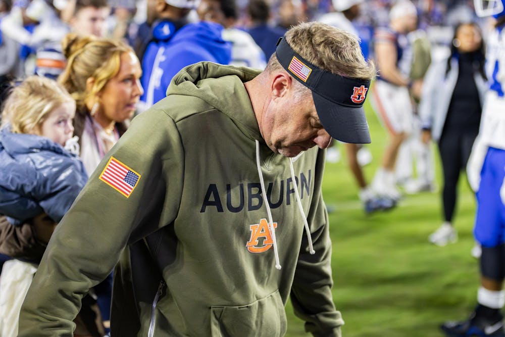 Hugh Freeze walks off following a loss to Kentucky in Jordan-Hare Stadium on November 1, 2025.