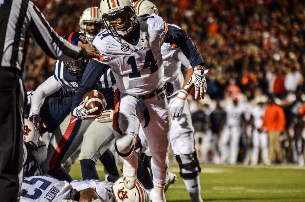 Nick Marshall runs for a touchdown against Ole Miss at Vaught-Hemingway Stadium.

Raye May / PHOTO EDITOR