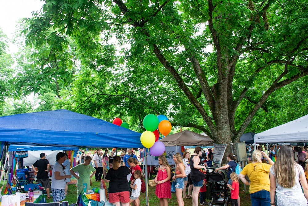 <p>Vendors and attendees gather at PrideFest at Kiesel Park on June 5, 2021, in Auburn, Ala.</p>