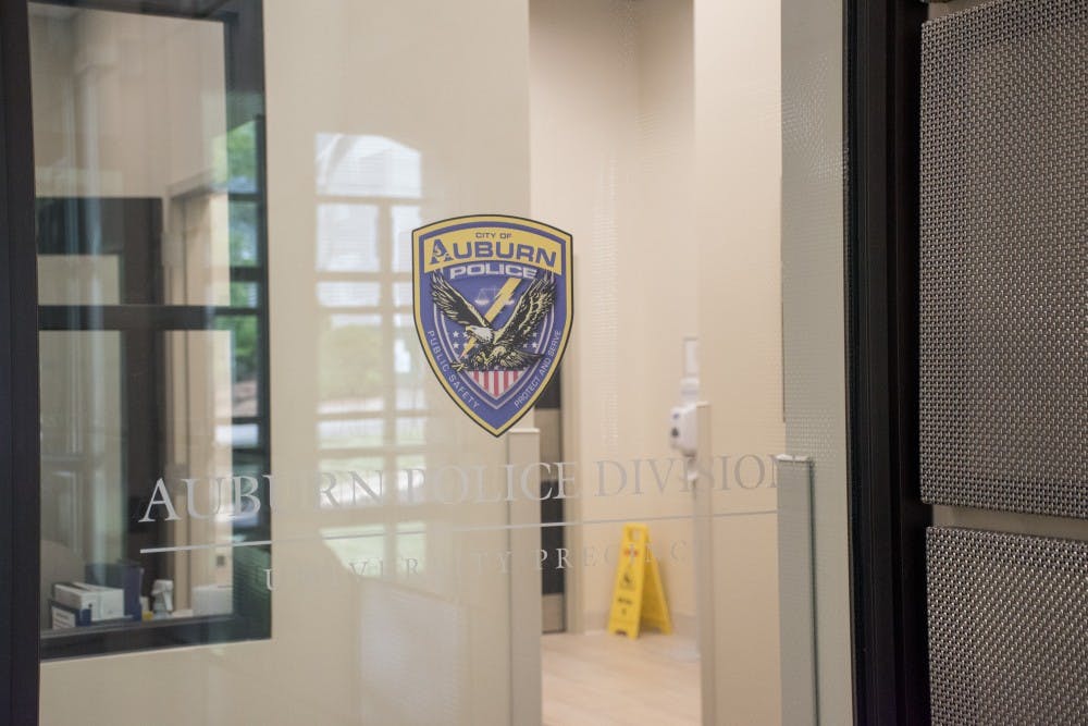<p>The door to the Auburn Police Division on Friday, April 6, 2018, in Auburn, Ala.</p>