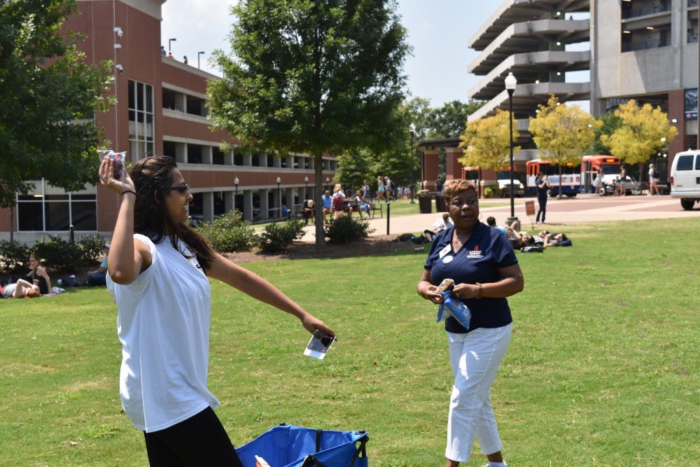 The COSAM office of diversity and multicultural affairs handed out Sun Chips and moon pies to students on the green space.