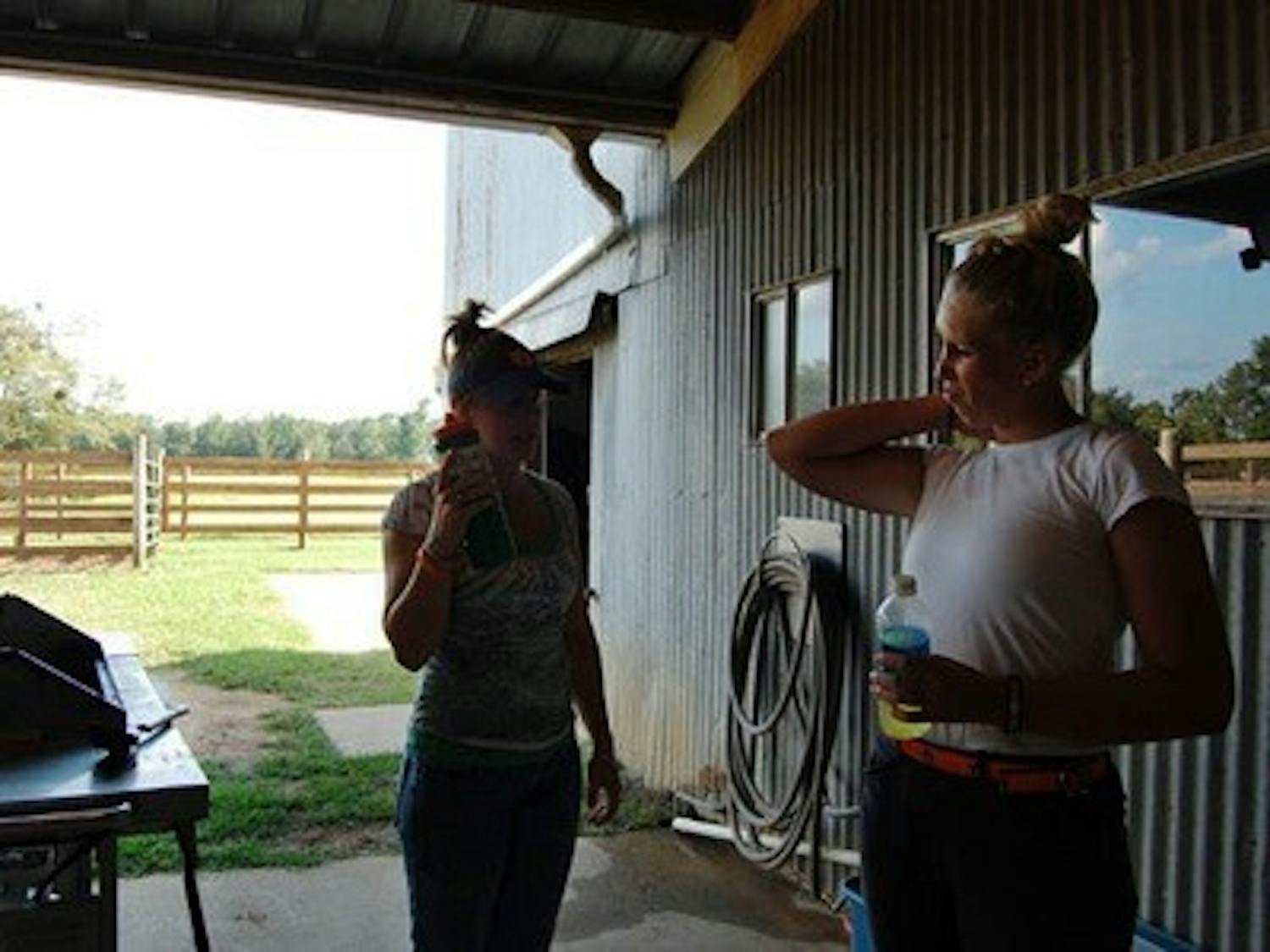 Anna and a teammate hanging out after a long day of practice.