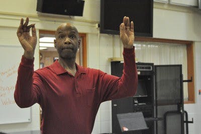 William Powell conducts Verdi's "Requiem" during a rehearsal with the AU choirs. (Kelly Tsaltas / Assistant Intrigue Editor)