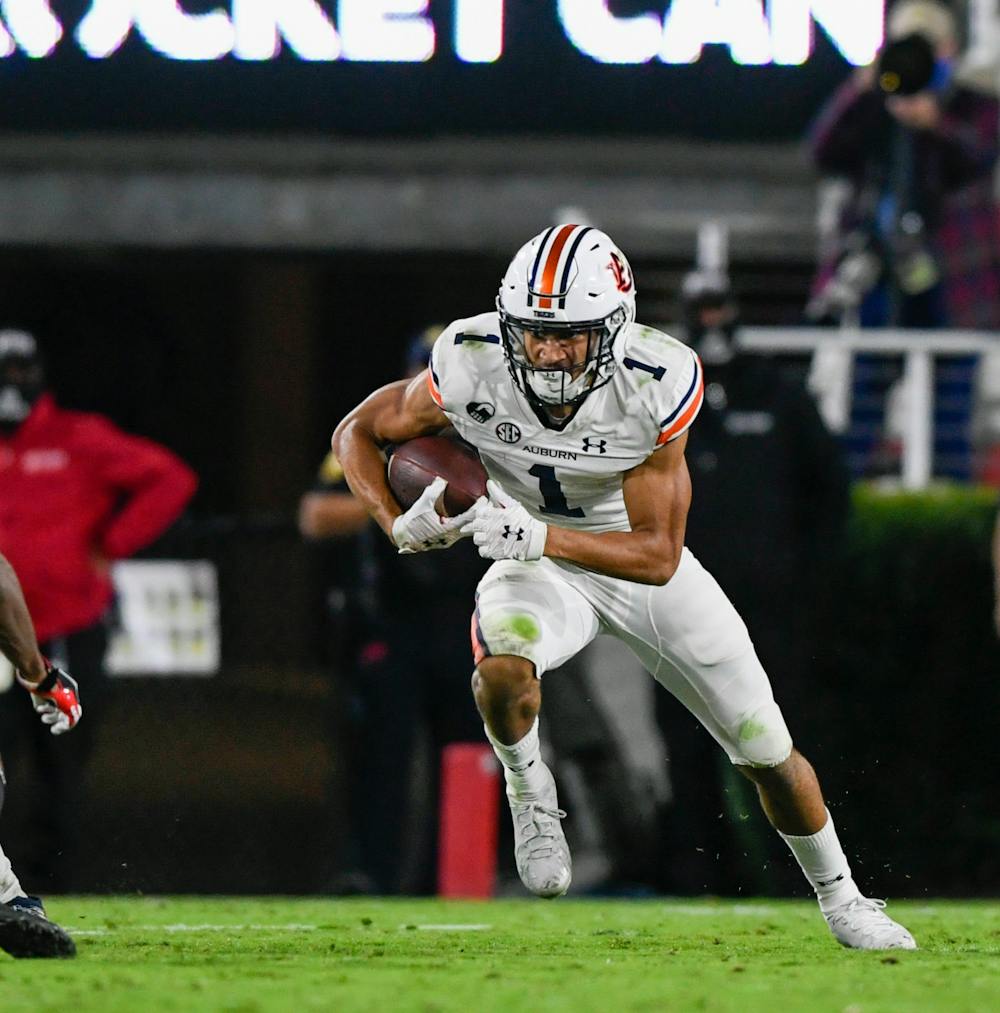 <p>Anthony Schwartz (1) runs after the catch during the game between Auburn and Georgia at Samford Stadium on Oct 3, 2020; Athens, GA, USA. Photo via: Todd Van Emst/AU Athletics</p>