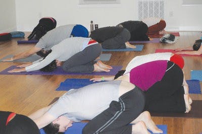 The White Lotus Health and Wellness Center in Opelika offers yoga classes five days a week and Thai classes once a week. (Christen Harned / Assistant Photo Editor)