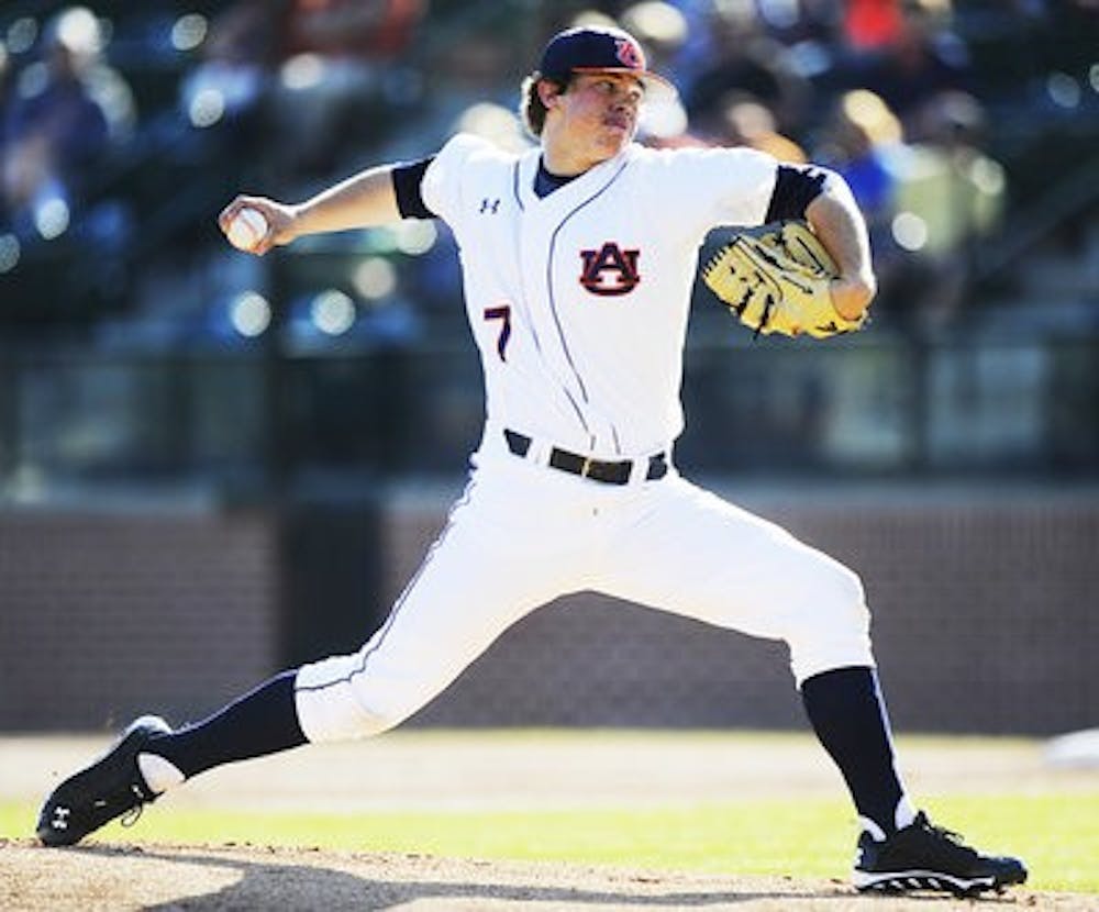 Keegan Thompson pitches during his first career one-hitter against Presbyterian on Saturday, March 1, 2014. (Zach Bland / Assistant Photo Editor)