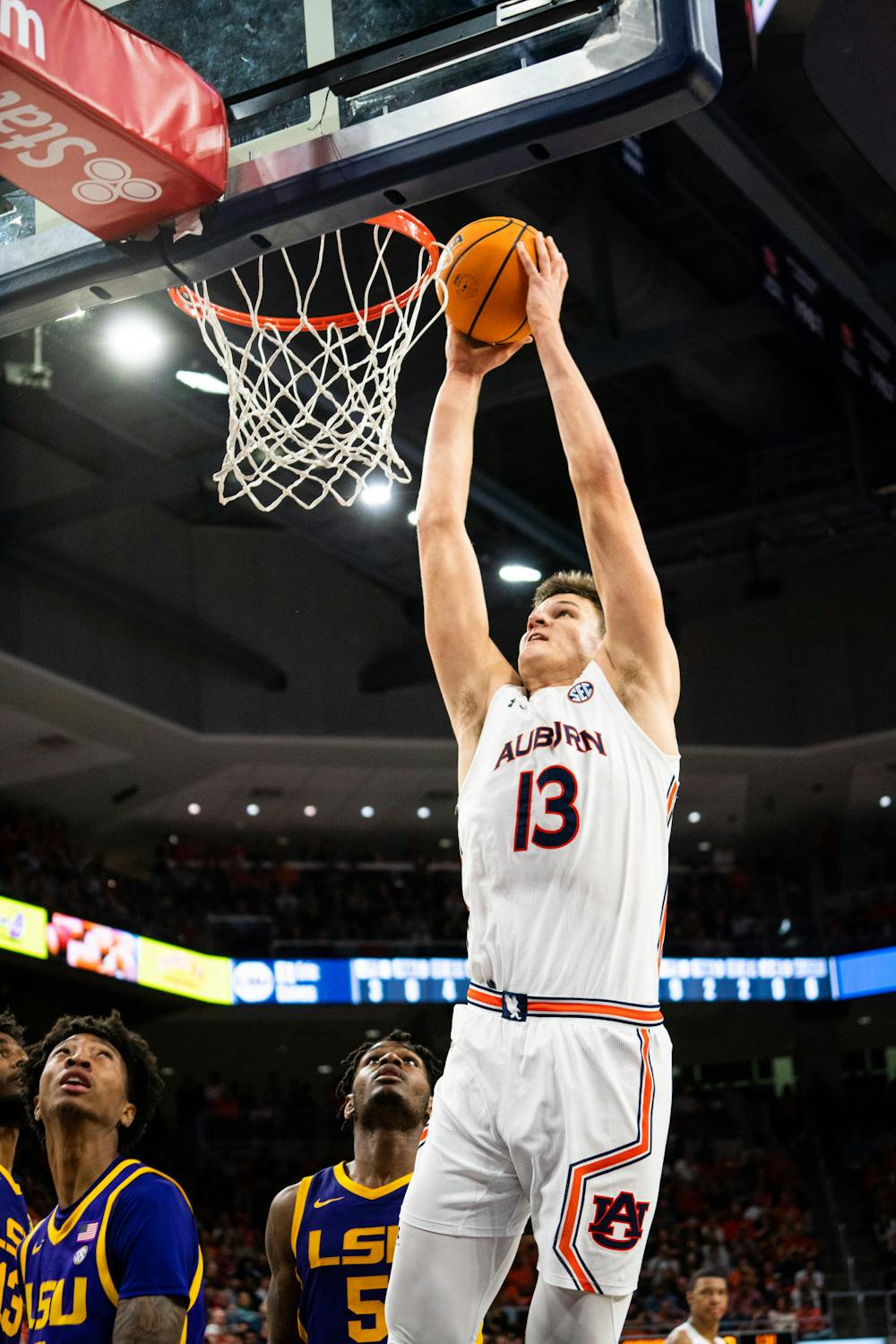<p>Dec. 29, 2021; Walker Kessler (13) goes for a dunk in a game against LSU from Auburn Arena in Auburn, Ala.</p>