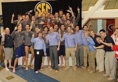 The Auburn men celebrate winning their 14th straight SEC Swimming and Diving Championship Saturday.SEC Swimming and Diving Championships in Athens, GA.,  on Saturday, Feb. 20, 2010. day 4 FINALSTodd Van Emst