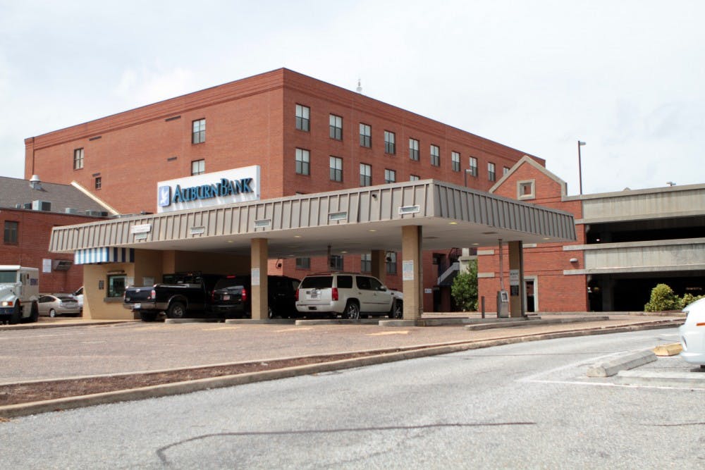 The Auburn Bank drive-thru will make way for temporary parking before being incorporated into the city's new plans for the northeast section of Toomer's Corner.(Rebecca Croomes / PHOTO EDITOR)