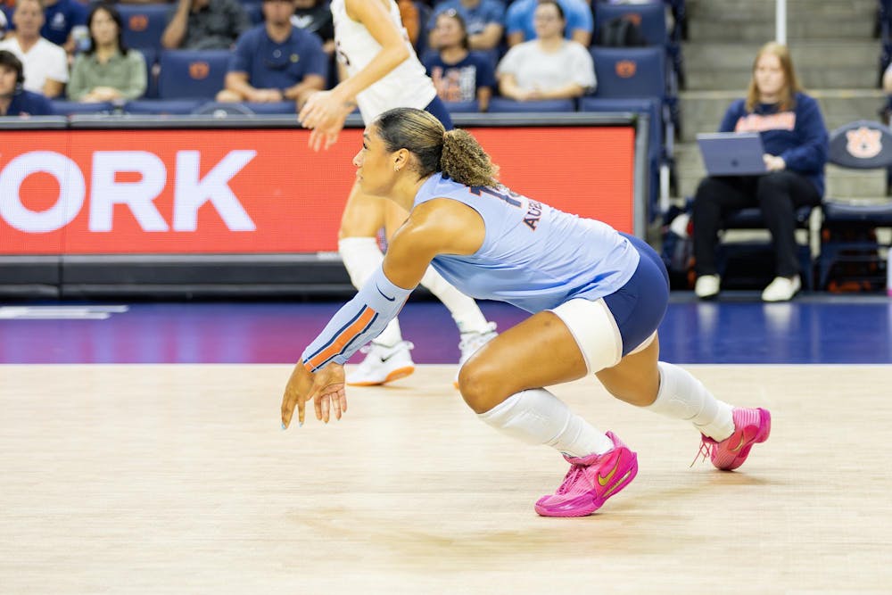 Alexis Dacosta (#15) bumps the volleyball in Neville Arena versus the University of Virginia on Sept. 9, 2025.