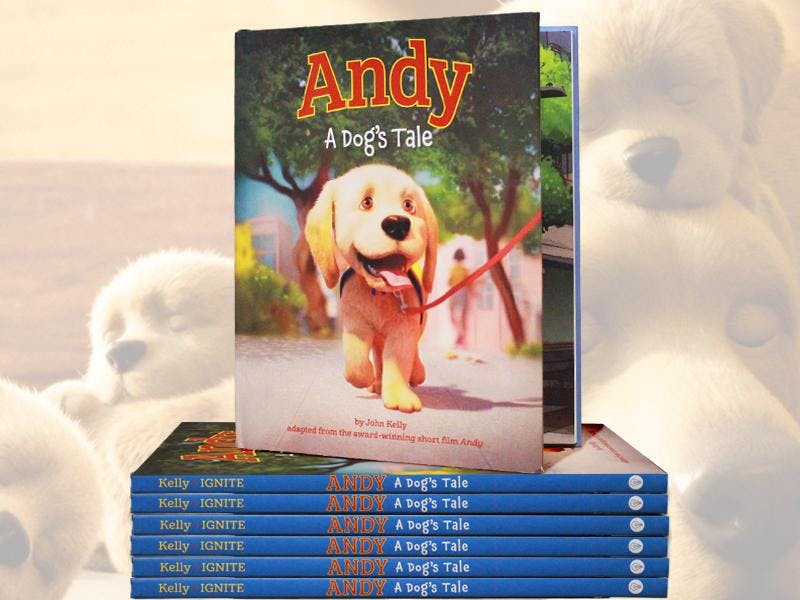A colorful children's book titled "Andy: A Dog's Tale" features a cheerful cartoon dog on the cover, with multiple copies stacked below it.
