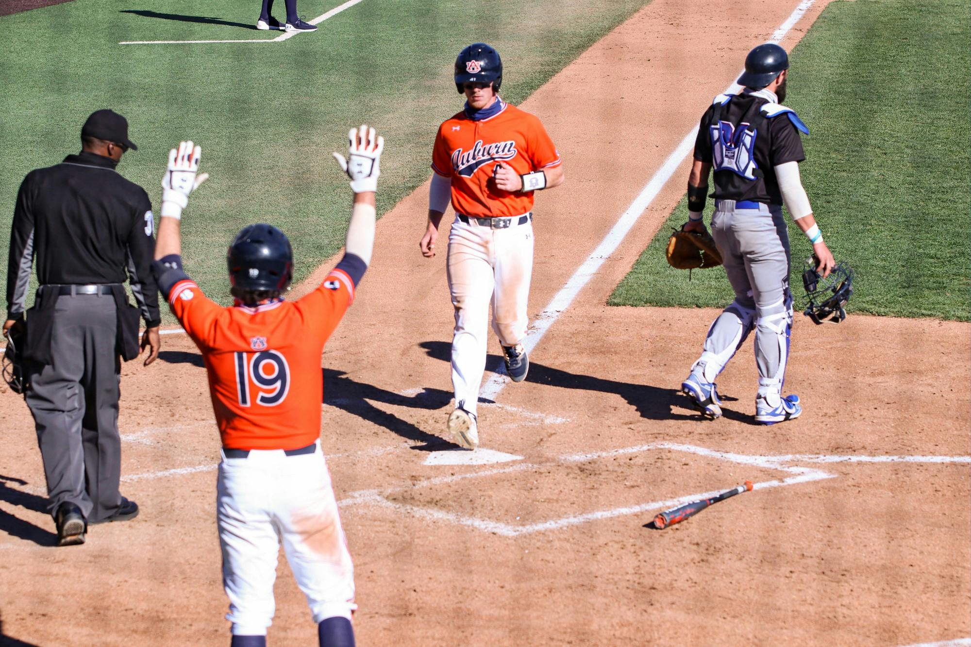 022121_Auburn_IMG_8460_Auburn Tigers outfielder Steven Williams (41) gets to home .jpg