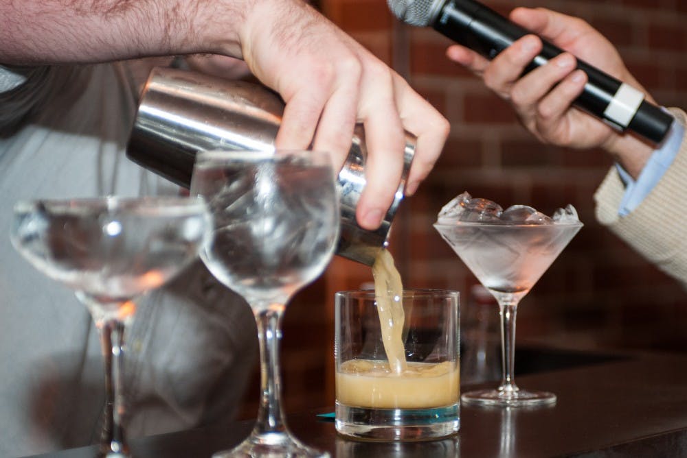 Avondale's Nolan Jones pours a drink during his turn of the competition. Bartender of the Year Competition on Wednesday, Sept. 27 at the Auburn University Hotel and Conference Center in Auburn, Ala.