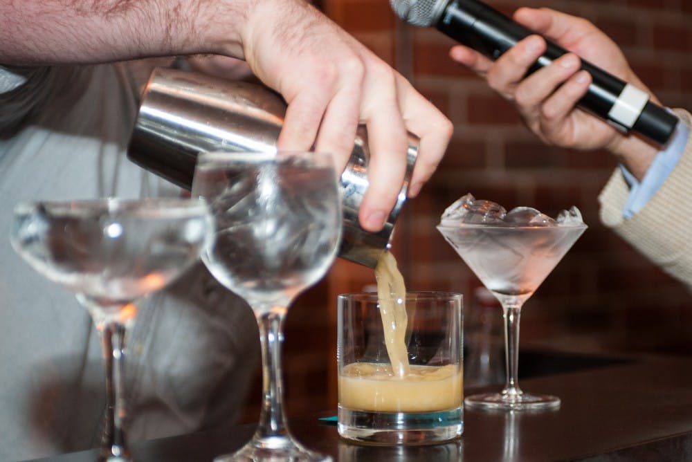 <p>Avondale's Nolan Jones pours a drink during his turn of the competition. Bartender of the Year Competition on Wednesday, Sept. 27 at the Auburn University Hotel and Conference Center in Auburn, Ala.</p>