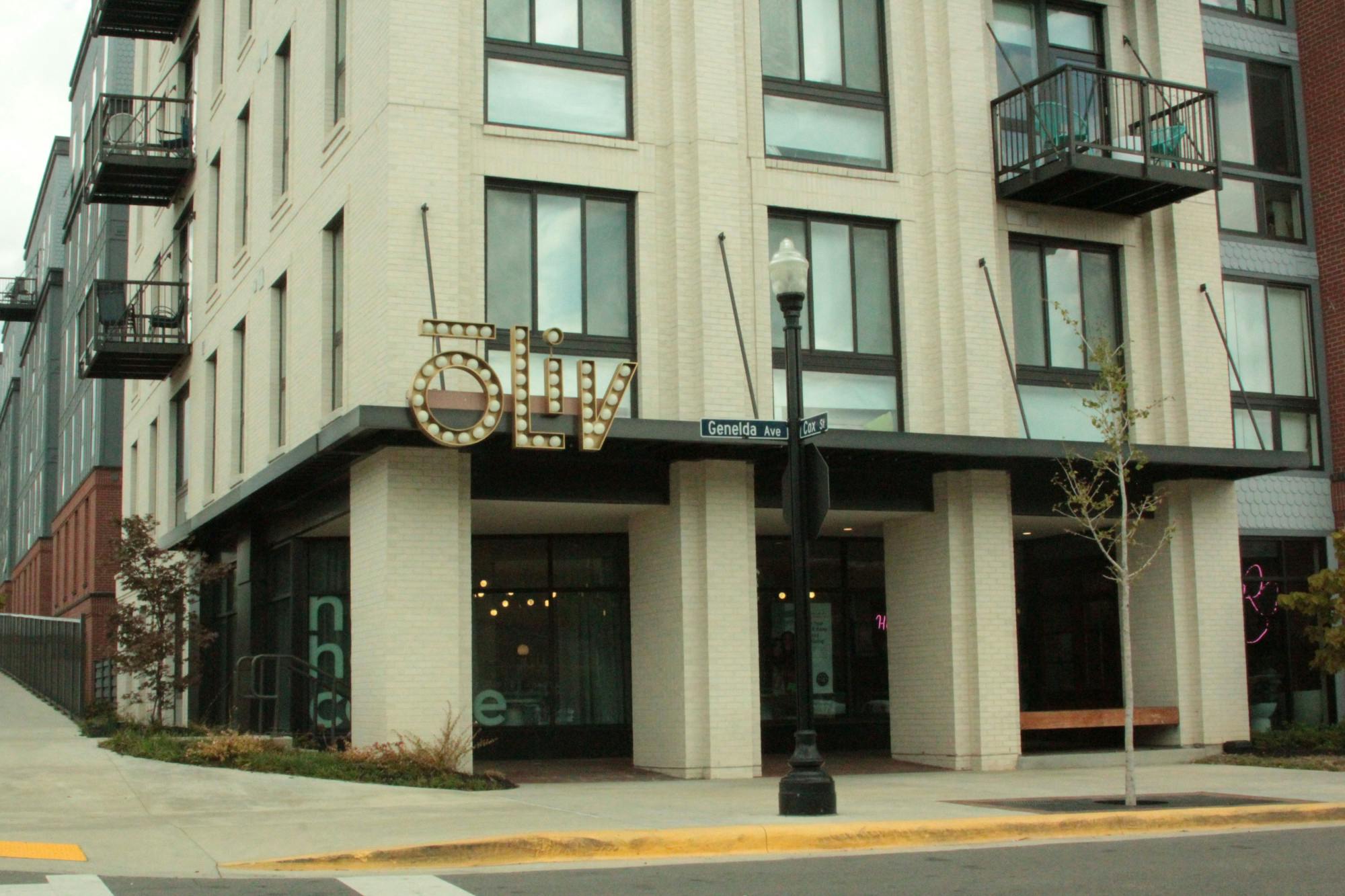 Front of Oliv building + sign