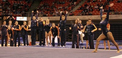 Rachel Inniss completes a tumbling pass on her floor routine against Pittsburgh. (Daniel Friday / Photo Staff)
